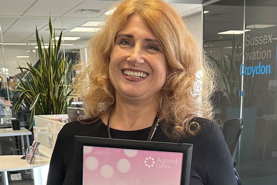 Claire Scaramanga with Taking Control of Goods certificate