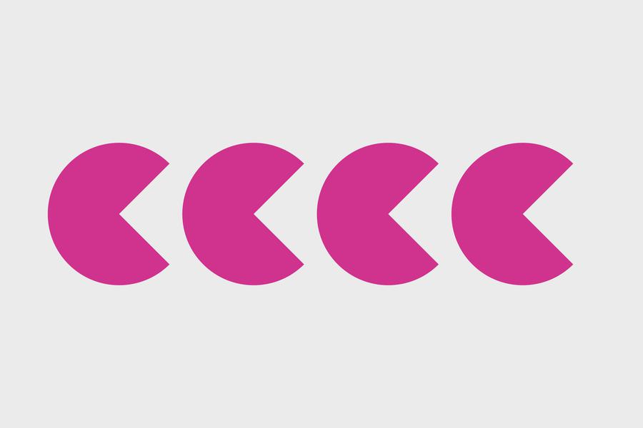 Four shapes that are pink and resemble the PACMAN character.
