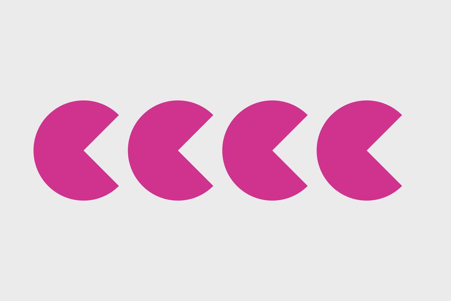 Four shapes that are pink and resemble the PACMAN character.