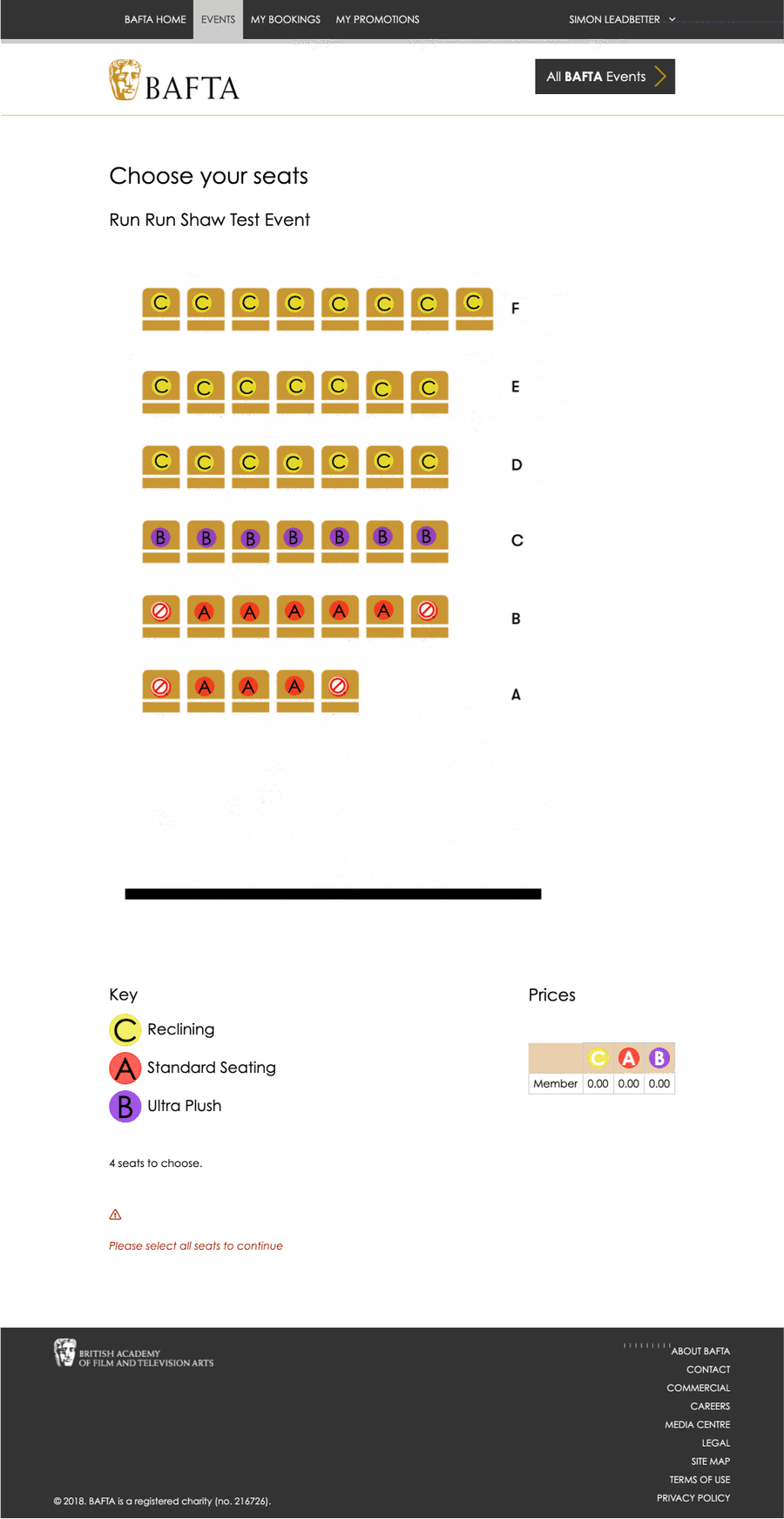 Screenshot of confusing seating plan on original website. It contains rows of faux chair icons with additional icons overlaid containing a letter that corresponds to key at the bottom of the page.