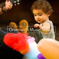 Greenwich Music School logo overlaying a small child in a music classroom