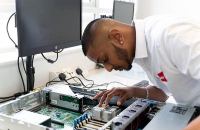 RedDoor Managed IT engineer fixing a computer
